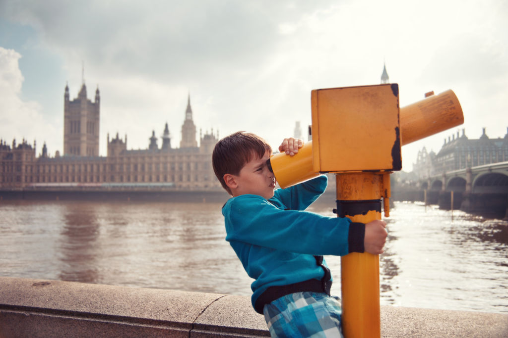 Child,Looking,Through,Coin,Operated,High,Powered,Binoculars.,View,Of
